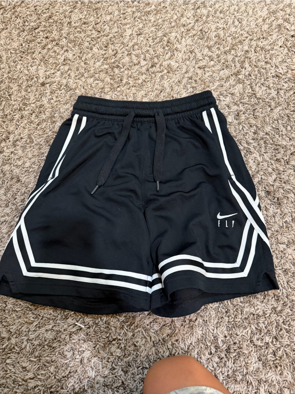 Nike women Black Athletic Shorts with White Stripes